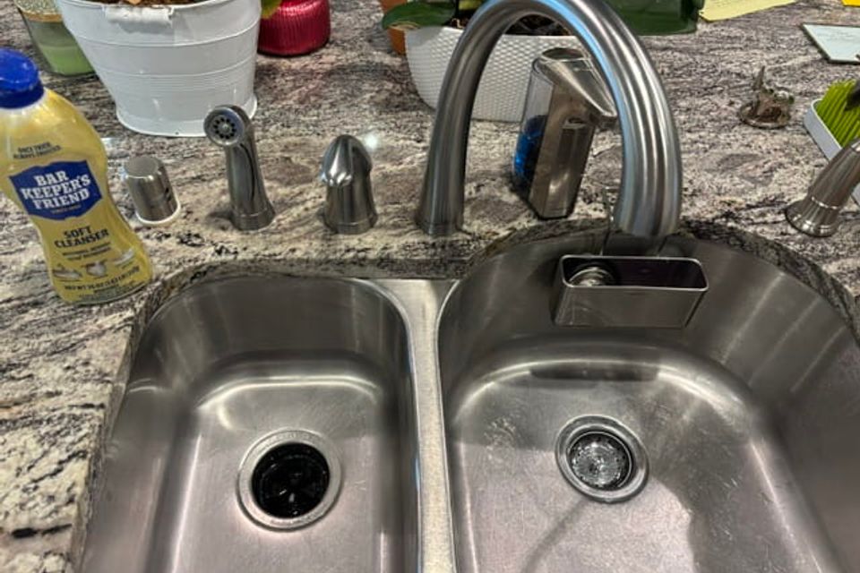 Kitchen sink and surrounding counter area after cleaning