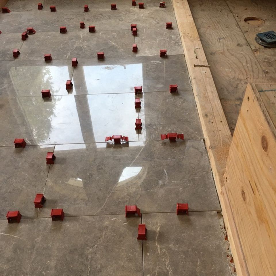 A heated floor installation project, done by Taurus Contracting Inc. of Suffolk County , NY