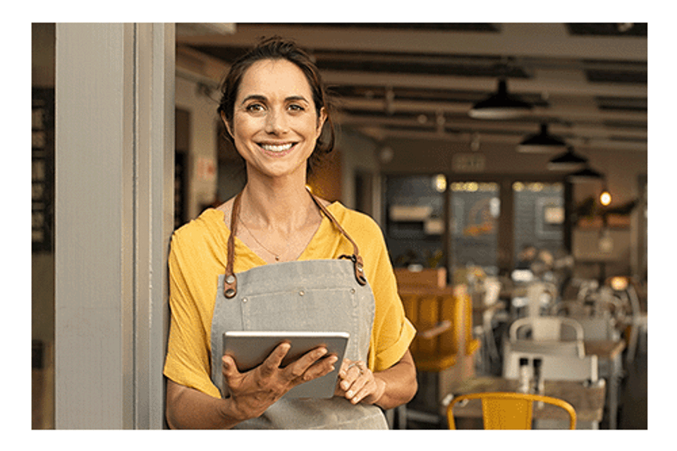 Waitress in yellow shirt