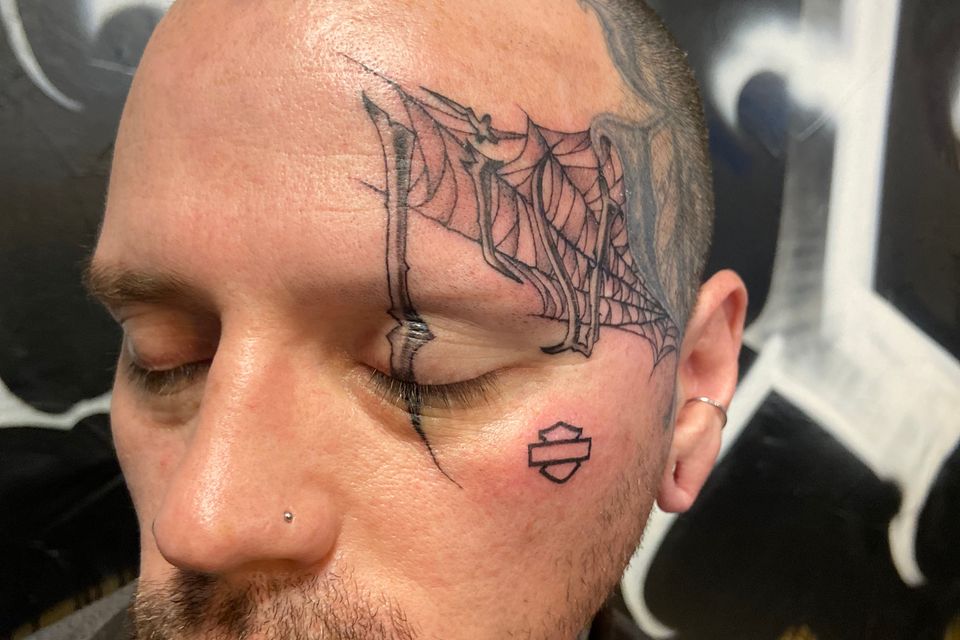 Detailed Face Tattoo in B&W