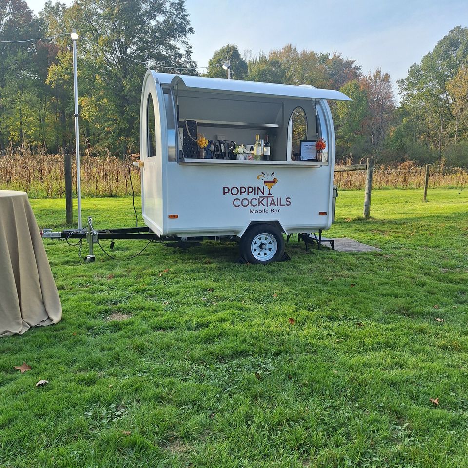 7ft wide mobile bar trailer with full-service setup for events of all sizes