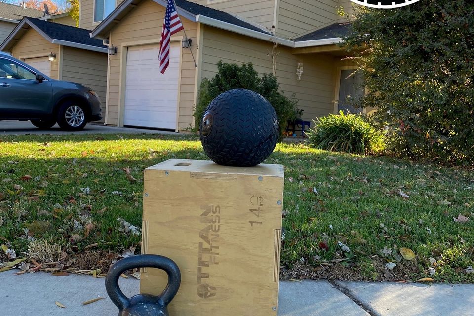 Image of a house and some workout equipment representing that we bring the gym to your home