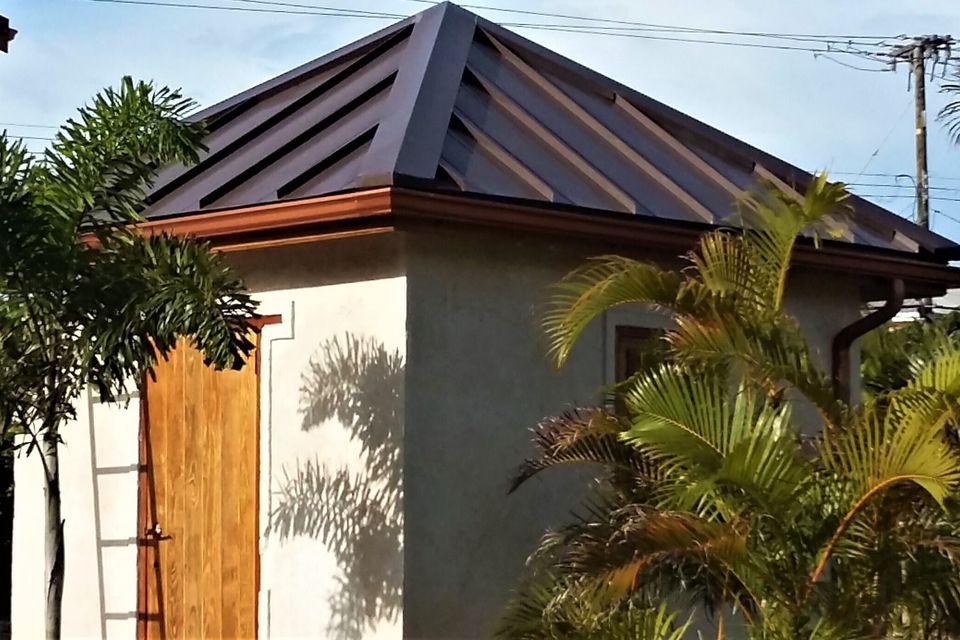 Copper metallic gutters with brown roof rotated