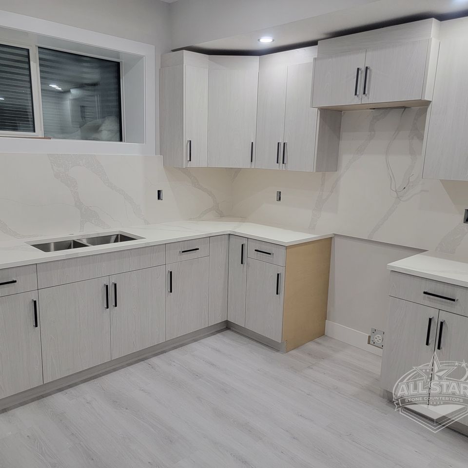 White kitchen countertops with full-height backsplash installation Houston, TX