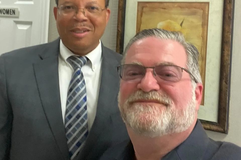 Charles Day with a fellow doctor in the office