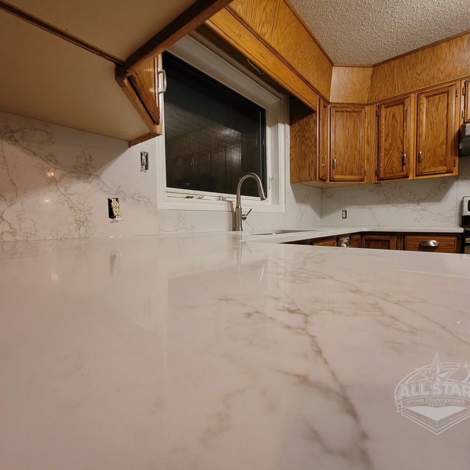 Close-up of marble-look kitchen countertop with custom stone installation in Houston, TX