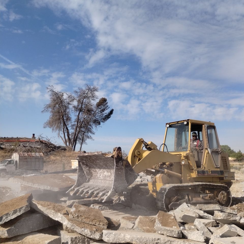 Image of a concrete slab being demolished